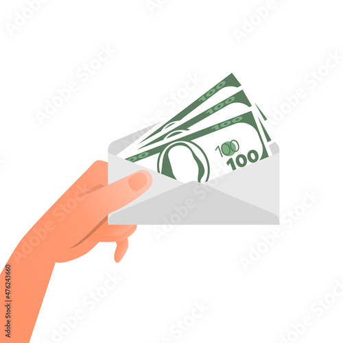 Hand is holding envelope with dollar banknotes. Corruption concept
