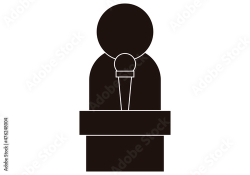 Icono negro de persona dando una rueda de prensa. 