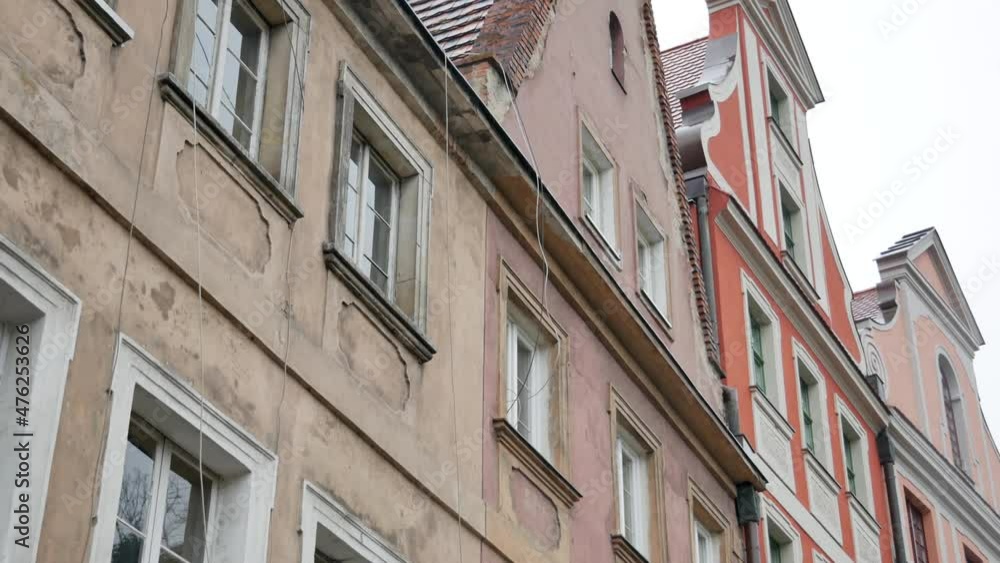 WROCLAW, POLAND - JANUARY 10, 2018: Ancient colorful buildings in winter in Wroclaw, Poland. 4K, Audio. Pan from left WROCLAW, POLAND - JANUARY 10, 2018: Ancient colorful buildings in winter in Wroclaw, Poland. 4K, Audio. Pan from left