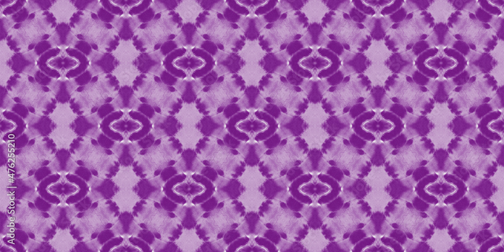 Beautiful tie-dye background. Abstract purple stains on the white fabric.	