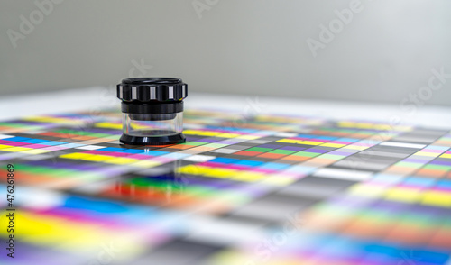 Color control of digital printed leaf with magnifier. Digital print color management.