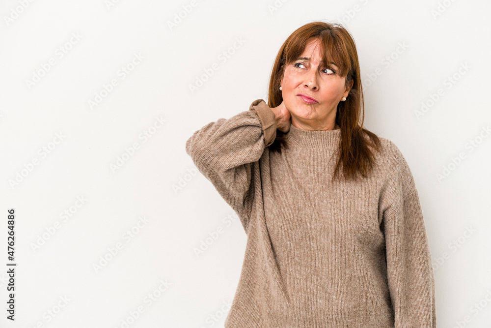 Middle age caucasian woman isolated on white background touching back of head, thinking and making a choice. Middle age caucasian woman isolated on white background touching back of head, thinking and making a choice.