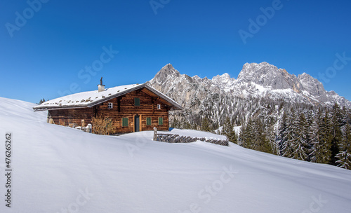 Alpine hut in an idyllic winter landscape, Salzburger Land, Austria © auergraphics