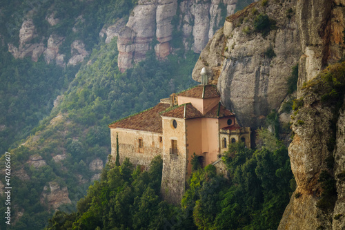 Canvas Mesmerizing view of Santa Cova chapel on the mountain Montserrat in Barcelona, S