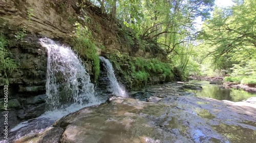 Waterfall in the Schlichemklamm valley in the south of Germany during summer. photo