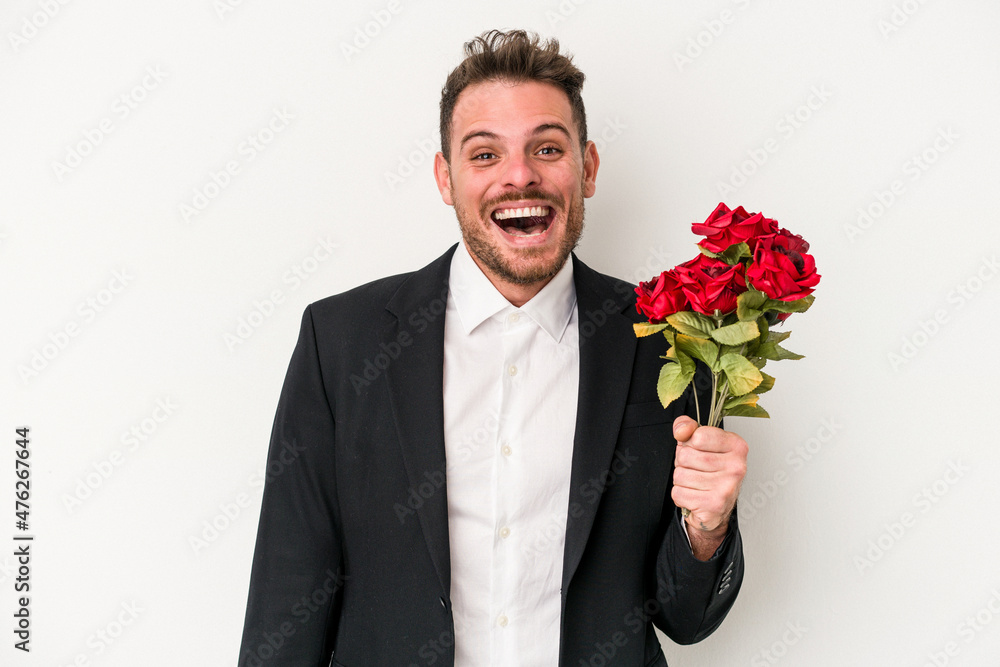 Young caucasian man holding bouquet of flowers isolated on white background Young caucasian man holding bouquet of flowers isolated on white background