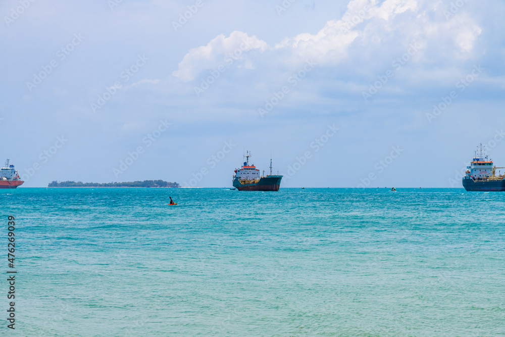 Cargo ships waiting near port of the Stone town. Zanzibar, Tanzania Cargo ships waiting near port of the Stone town. Zanzibar, Tanzania