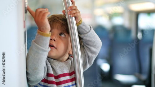 Little boy riding bus. Child inside tram transportation