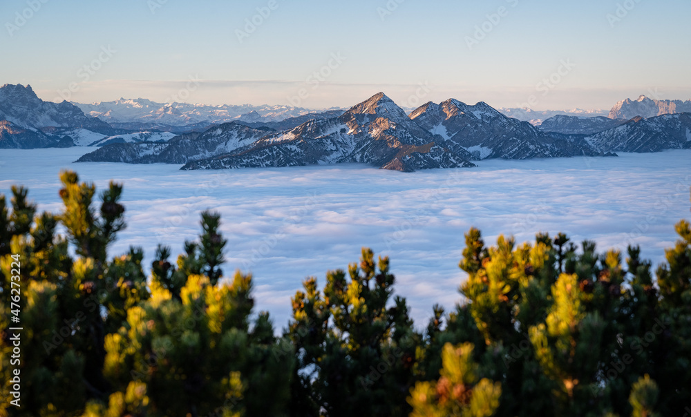 Snow-covered Sonntagshorn above a sea of clouds, Salzburger Land, Austria