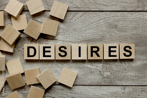DESIRE word on wood blocks concept. on a wooden table. Business concept