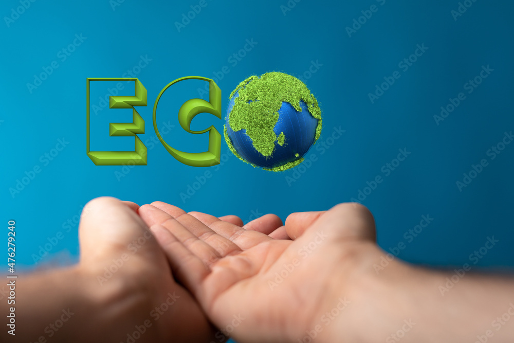 Eco word on the background of green leaves of carrots. plantation Eco word on the background of green leaves of carrots. plantation