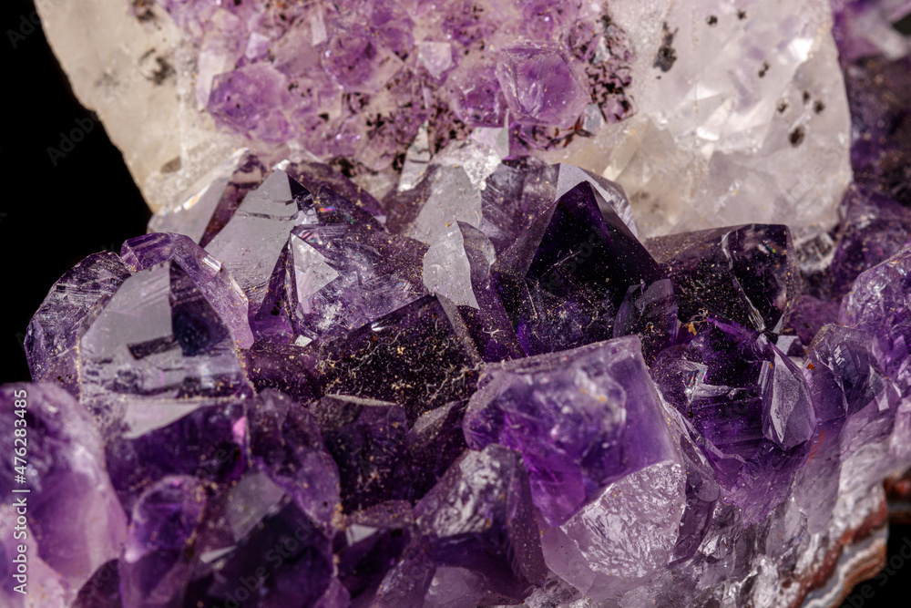 Fototapeta premium macro mineral amethyst stone with calcite black background