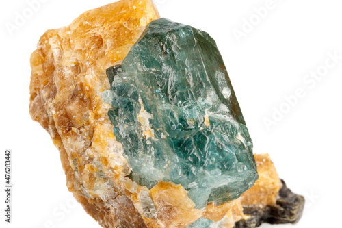 macro stone mineral apatite in calcite on a white background photo