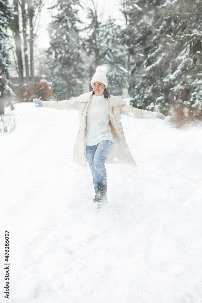 Funny woman playing with snow at the park Funny woman playing with snow at the park