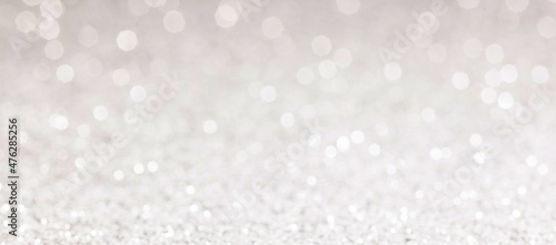 glitter silver background abstract banner, de-focused. Copy space