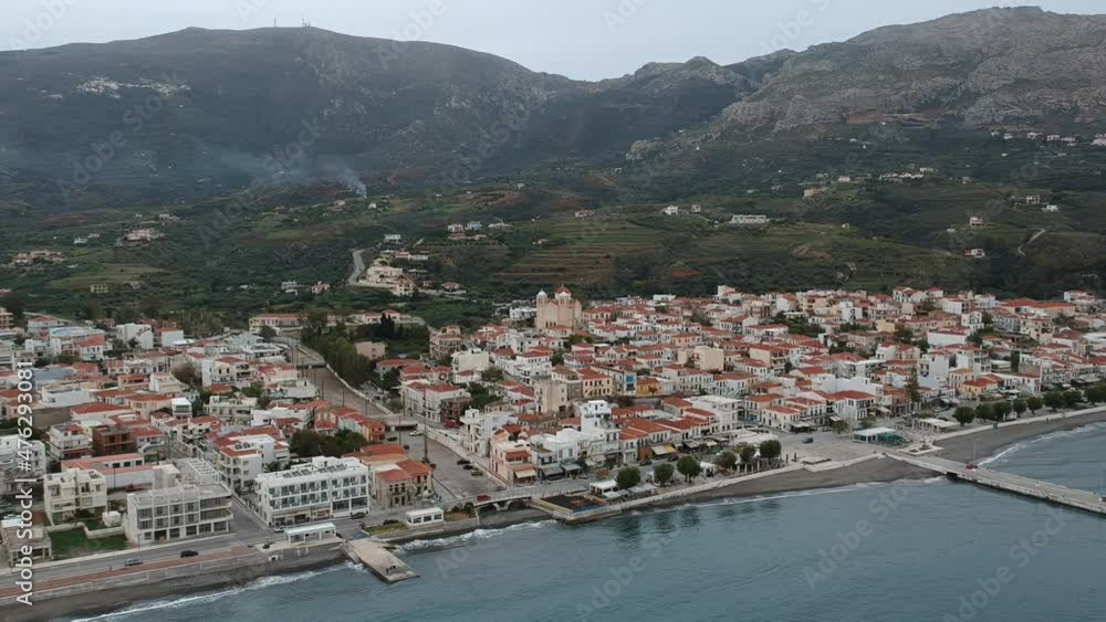Aerial cityscape view of Neapolis town at sunset. Also named Vatika in Laconia, Greece. Neapoli is a famous coastal town built on the same site as the ancient Laconian city of Boeae Aerial cityscape view of Neapolis town at sunset. Also named Vatika in Laconia, Greece. Neapoli is a famous coastal town built on the same site as the ancient Laconian city of Boeae