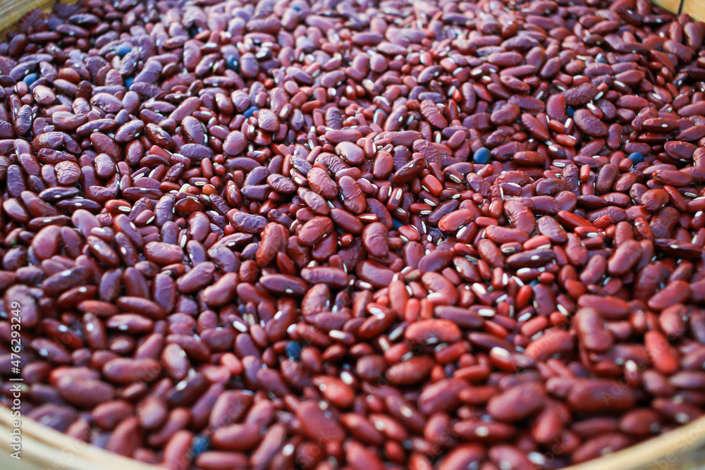 Red kidney beans in a wooden stick together. Local culture. Red kidney beans in a wooden stick together. Local culture.