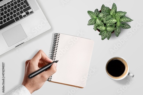 2021 plan notepad list concept, hand writing notepad on office desk.