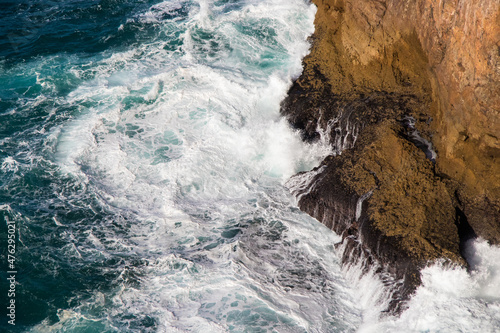waves crashing on rocks