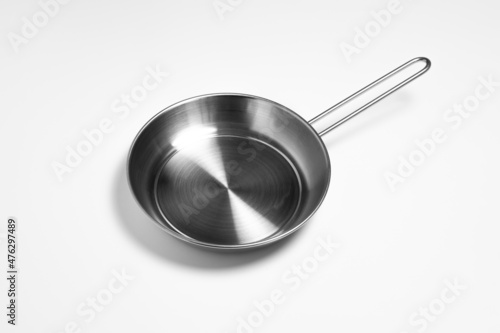 Stainless steel frying pan isolated on white background.High resolution photo.Top view. Mock-up.