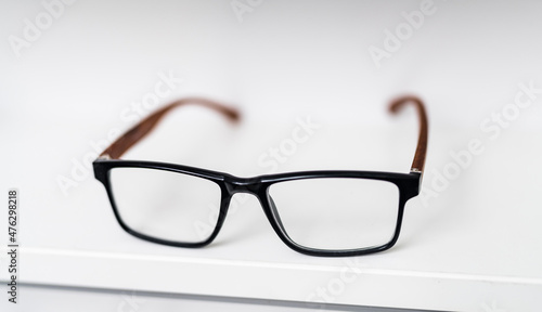 Eyeglass lenses close up view. Eyewear correction stylish frame with glasses.
