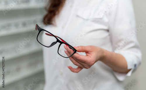 Eyewear correction stylish frame with glasses. Eyeglass lenses close up view.