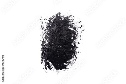 Black paint smear or mascara isolated on white background