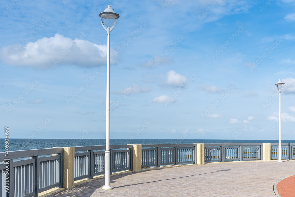 Lampposts at the railings along the sea embankment.