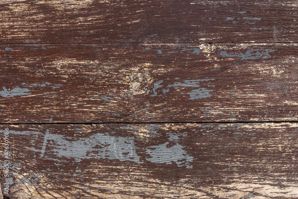 Fototapeta premium The texture of an old wooden painted surface.
