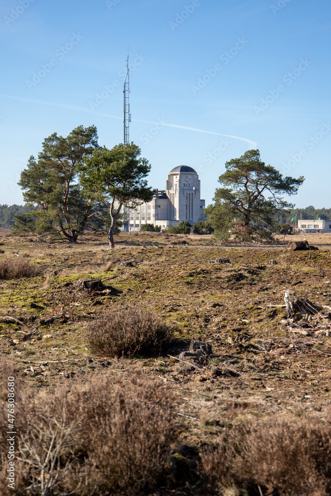 Old art deco style radio station in the middle of nature