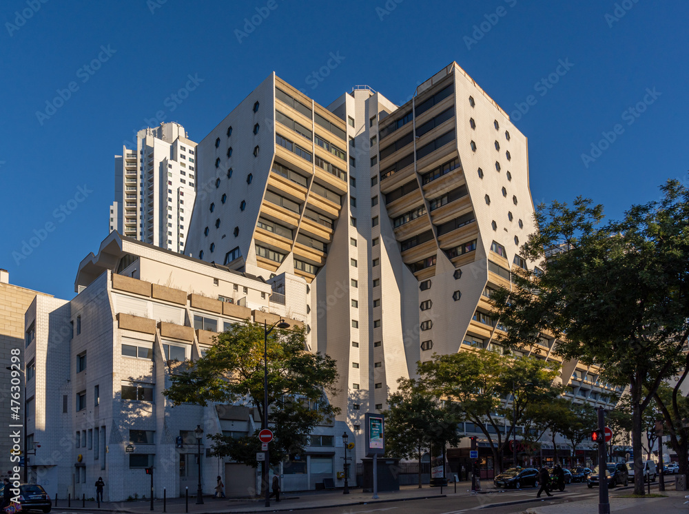Paris, France - 10 16 2021: Flandres district. Modern Facade of building at sunrise