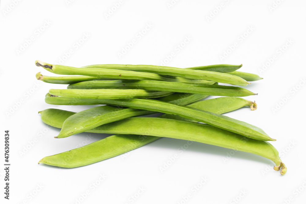 Flat Long Green Runner Beans Known As Jhar Sim, Falia, Keralan, Sem Ki Phali, Surti Papdi, Guar Ki Fali, Gawar Isolated On White Background. Vegetable. Used To Cook Curry Bhaji Sabji Or Hari Sabzi Flat Long Green Runner Beans Known As Jhar Sim, Falia, Keralan, Sem Ki Phali, Surti Papdi, Guar Ki Fali, Gawar Isolated On White Background. Vegetable. Used To Cook Curry Bhaji Sabji Or Hari Sabzi