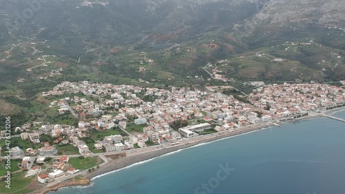 Aerial cityscape view of Neapolis town at sunset. Also named Vatika in Laconia, Greece. Neapoli is a famous coastal town built on the same site as the ancient Laconian city of Boeae photo