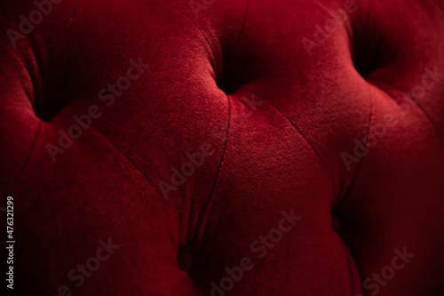 Fotografie gros plan sur un fauteuil ou un sofa en velour molletonné symbolisant le luxe et