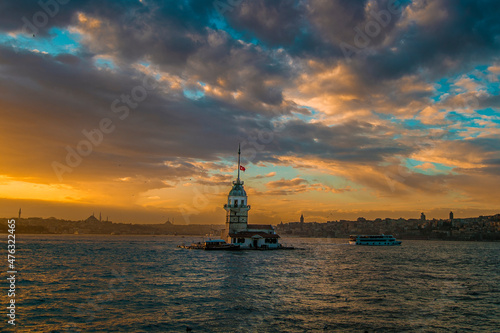 Maidens Tower at sunset, İstanbul. Beautiful clouds with blue sky. Historical light house of İstanbul © Birol