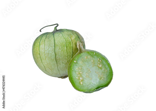 physalis philadelphica. Tomatillo or Mexican husk tomato. Fresh organic green tomatillos (Physalis philadelphica) with a husk. One whole isolated on white and one half of it