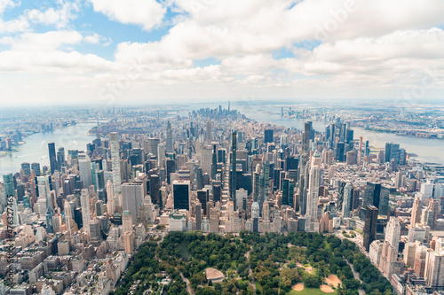 Aerial panoramic city view of Midtown Manhattan neighborhoods towards lower Manhattan and Downtown  Central Park on bottom  New York City. Bird s eye view from helicopter of metropolis cityscape
