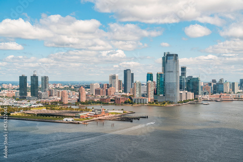 Aerial panoramic city view of New Jersey City financial Downtown skyscrapers. Bird's eye view from helicopter. Jersey city is an important transportation center for the Port of New York and New Jersey