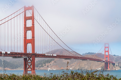 The iconic view of the Golden Gate Bridge from South side of the bridge at day time, San Francisco, CA. Picturesque panorama on Golden Gate National Recreation area and Battery Spencer over the bridge © VideoFlow
