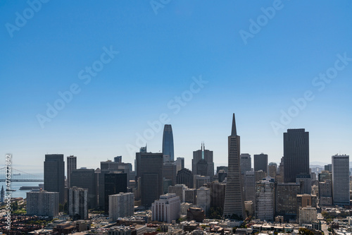 Panoramic view of San Francisco skyline at clear blue summer daytime from Coit Tower  Financial District and residential neighborhoods  California  United States.
