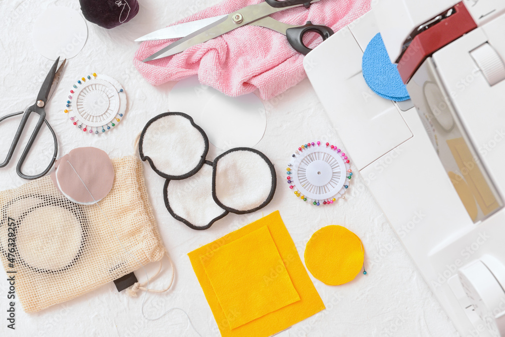 Materials for making reusable cotton pads on white background Materials for making reusable cotton pads on white background
