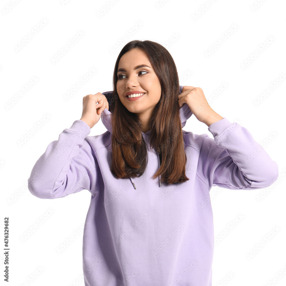 Beautiful young woman in stylish hoodie on white background Beautiful young woman in stylish hoodie on white background