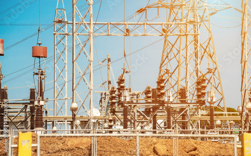 High and medium voltage switchgear in power substation, High voltage circuit breakers and insulated switchgear on electrical substation photo