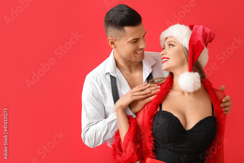 Sexy young couple on color ...