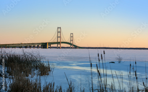 Mackinac bridge in winter time connects to Michigan lower peninsula and upper peninsula. photo