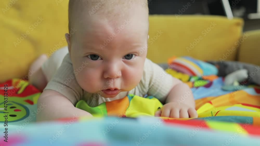 Newborn baby crawling on belly Newborn baby crawling on belly
