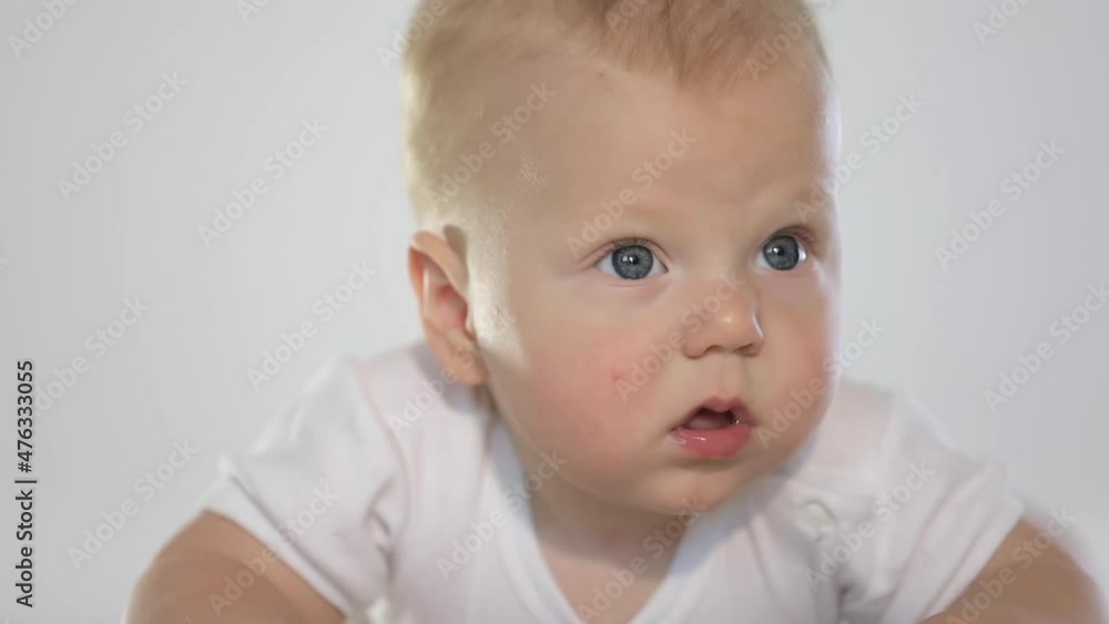 Caucasian blonde child yawns, toddler's correct sleep Caucasian blonde child yawns, toddler's correct sleep