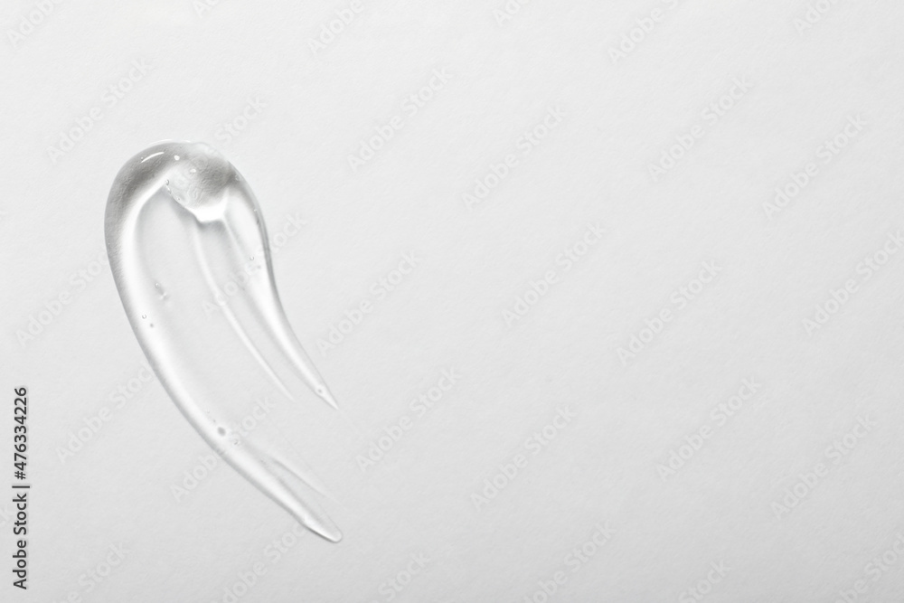 Sample of cosmetic gel on white background, top view. Space for text Sample of cosmetic gel on white background, top view. Space for text