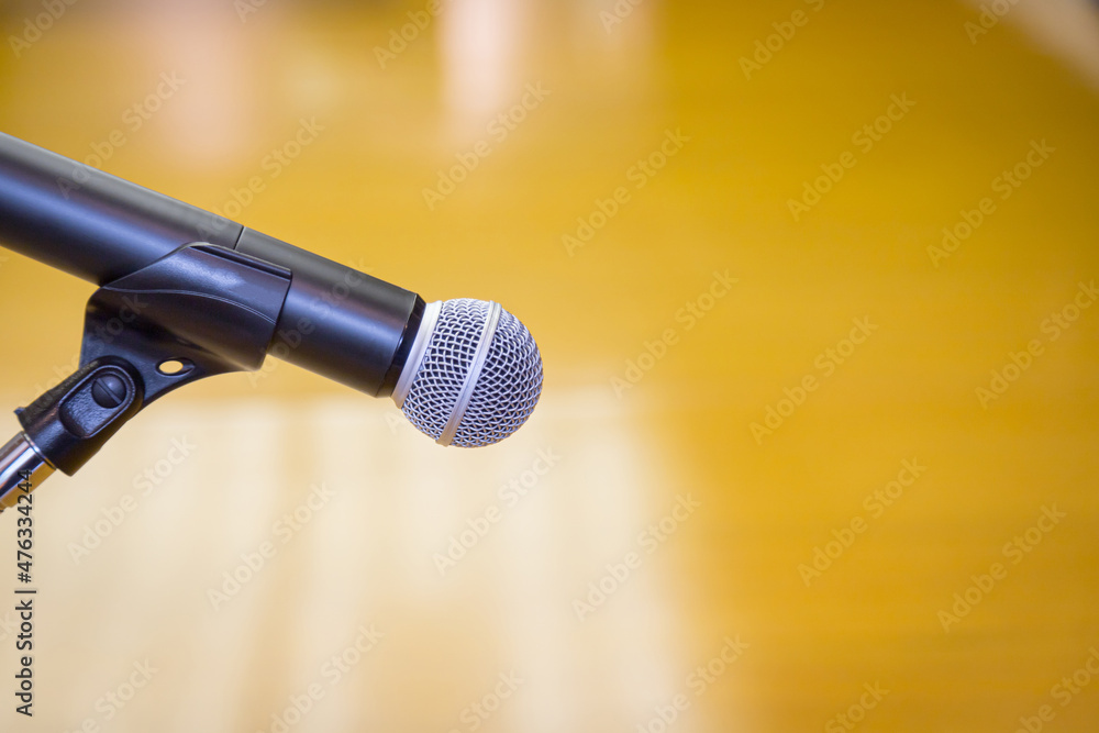 Fototapeta premium Close up of microphone on a podium in an auditorium