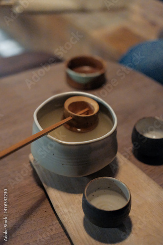 Chinese rice wine and bamboo spoon